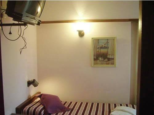 Hosteria Bavaria Villa Gesell Habitación foto